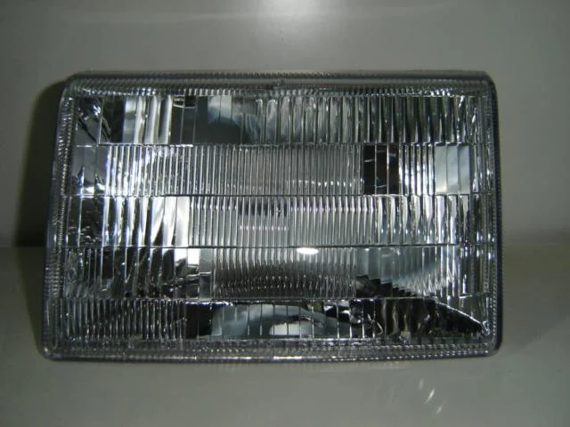 Jeep Grand Cherokee 93-*Faro Izq (Hb1) (Cristal Metacrilato)